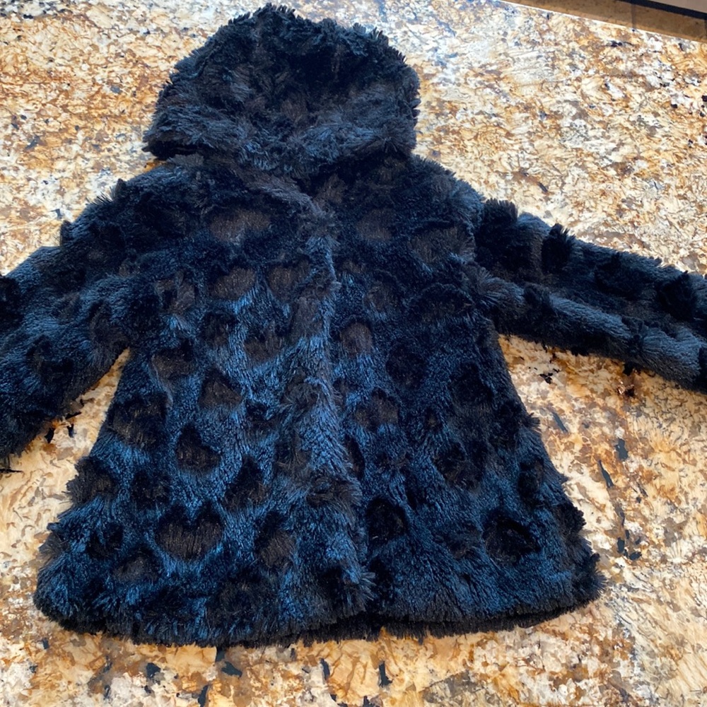 The most Adorable faux fur Jacket.